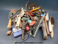 A quantity of tools to include screwdrivers, trowels,