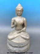 A metal figure of Guanyin on a lotus throne (49cm tall)