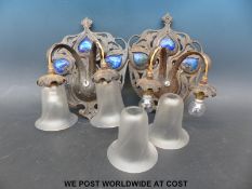 A pair of enamel and embossed metal Art Nouveau / Arts & Crafts style light fittings with hanging