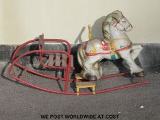 Tri-ang style metal rocking horse with slatted wooden seat