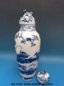 A 19thC Chinese vase and cover decorated with tigers and other animals (32cm diameter)