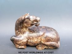 A 19thC Chinese jadeite carving of a horse (length 19cm)