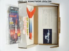 Esters Alpha III Flinging Model Rocket trade display pack with rocket and slogan 'These things