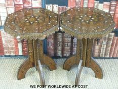 A pair of Eastern inlaid octagonal side tables (52cm tall,
