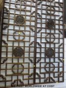 A pair of 20thC Chinese hardwood screens with auspicious symbols (116cm tall)
