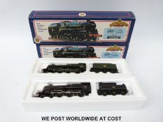 Two Bachmann 00 gauge BR 4-6-0 Standard Class 4 locomotives 75069 in green livery 31-104 and 75006