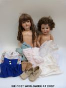 Two Armand Marseille bisque headed dolls, one with open mouth, weighted brown eyes,