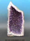An amethyst quartz geode (22cm tall, 26cm wide, weight 4.