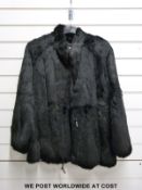 A ladies' black fur / faux fur jacket, labelled Jacques Saint Laurent,