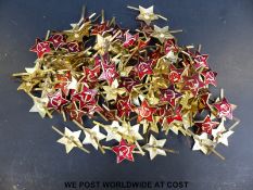 Approximately 100 Russian badges with red star,