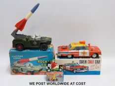 Three friction powered cars, a Siren Chief Car, Rocket Car and Buckler Go-Kart,