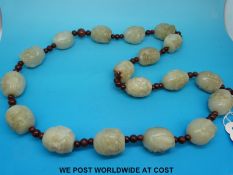A 19th/20thC Chinese Buddhistic carved jade lohan Mala (necklace) the 18 carved jade heads