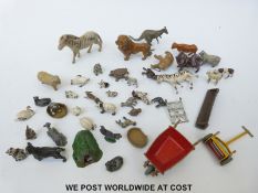 A collection of lead farm and zoo animals to including a zebra, lion, monkey, sheep, kangaroo,