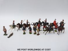 Twenty Britains hollowcast lead soldiers including four Zulu warriors,
