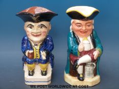 A Torquay Pottery toby jug together with a musical toby jug