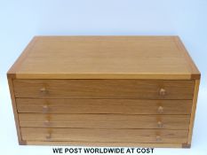 An oak four-drawer cabinet for a Meccano Outfit No 10