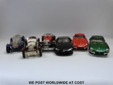 Six Burago 1:18 scale diecast model cars.