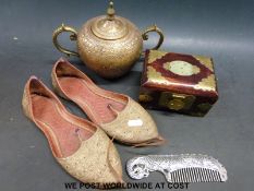 A pair of Eastern shoes together with a Chinese white metal comb,