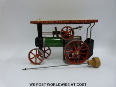 A Mamod TE1A live steam traction engine with methylated spirits burner and spring type whistle