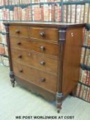 A 19thC mahogany chest of two over three drawers flanked by columns (W128 x D57 x H128cm)