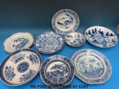 A collection of Chinese blue and white plates to include Kangxi and 19thC (largest 24cm diameter)