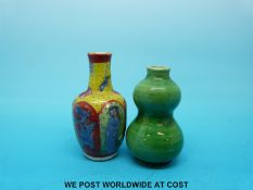 A miniature Chinese Kangxi vase decorated with figures and a miniature Chinese double gourd vase
