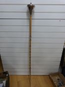 A civic mace with looped chain decoratives to staff section,