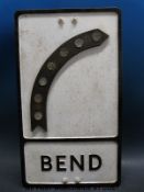 A wood and aluminium 'bend' road sign with inset reflectors (53 x 31cm)