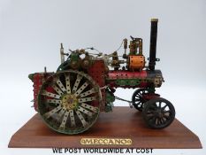 Meccano model of a traction engine with 20 volt electric motor on wooden plinth with Meccano plaque