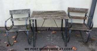 A garden table and two chairs