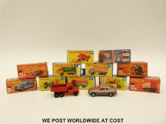 Ten Matchbox 1-75 series diecast model vehicles and trains,