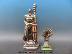 A 'knight' companion set and a wheat sheaf shaped doorstop
