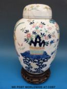 An 18thC Chinese export vase decorated with antiques and floral decoration,