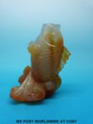 A Chinese carved carnelian agate scent bottle in the form of a fish