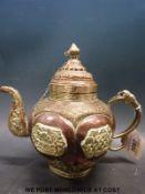 A 19thC copper teapot with white metal mounts (20cm tall)
