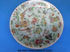 A Chinese famille rose plate decorated with painted insects,
