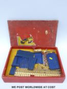 Meccano Outfit No 7 comprising blue and yellow components together with a similar smaller set,