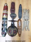 A collection of large tribal African masks