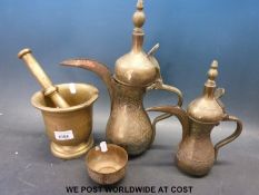 A brass pestle and mortar,