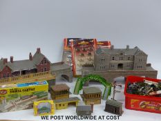 A large collection of 00 gauge model railway buildings,