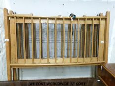 A c1900 child's cot with brass fittings (H58 x L122cm)