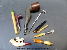 A 19th/early 20thC pipe in the form a ladies' stockinged leg,