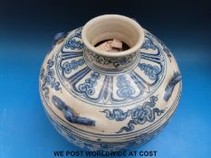 A Chinese blue & white jarlet of globular form with small ring handles,