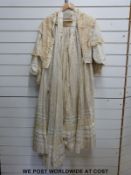 A Victorian ivory silk and lace skirt and matching bodice with stays