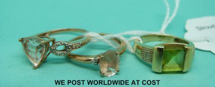 Two 9ct gold rings set with diamonds and rose quartz and a 9ct gold ring set with peridot and