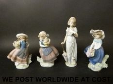 Four Lladro figurines of girls