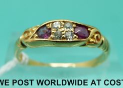 An 18ct gold ring set with diamonds and rubies (size P)