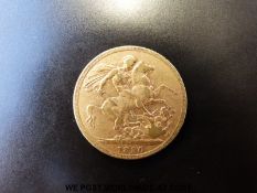 An 1890 gold full sovereign,