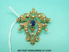 A 15ct gold brooch/pendant set with a sapphire and seed pearls