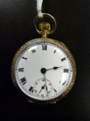 A 9ct gold ladies keyless fob watch with chased decoration, the enamelled dial with Roman numerals,